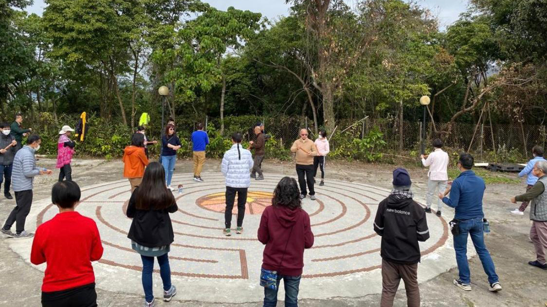 Rev. Dominic Chan practises Tai Chi Spirituality with trainees