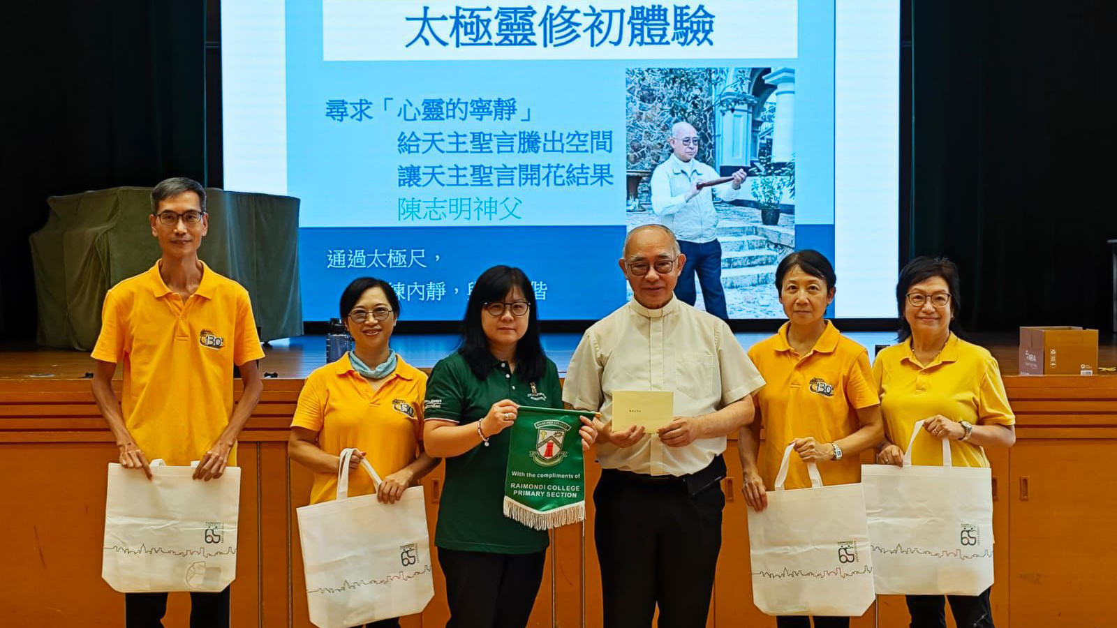 Rev. Dominic Chan and assistants explore Tai Chi Spirituality with the teachers of Raimondi College Primary Section